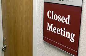 05closed door meeting sign