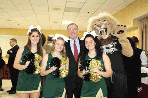 01-26-11-dr.-hancock-with-king-and-cheerleaders.gif