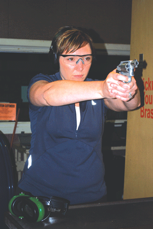 08-04-10-woman-with-gun.gif