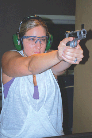 08-04-10-woman-with-gun2.gif